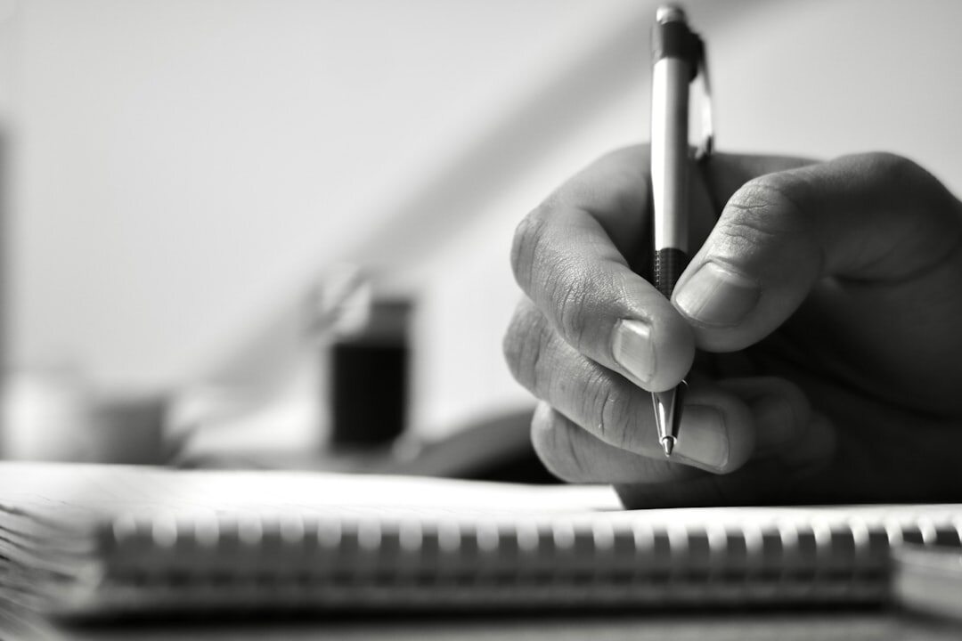person writing notes