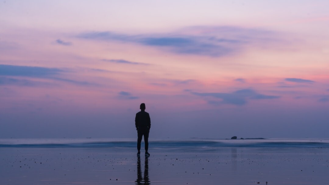 person reflecting alone after talk